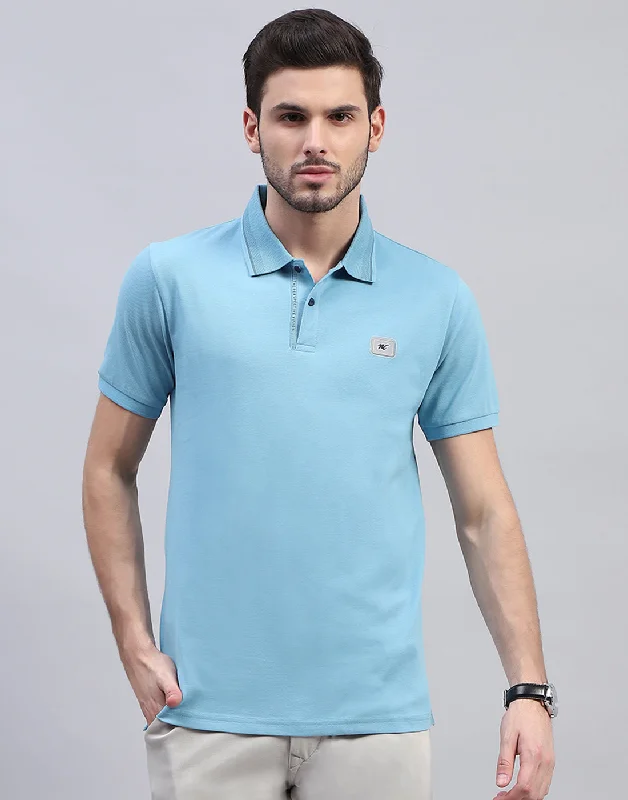 men's performance sweaters-Men Sky Blue Solid Polo Collar Half Sleeve T-Shirt